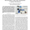 A Rapidly Prototyped 2-axis Positioning Stage for Microassembly using Large Displacement Compliant Mechanisms