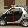 Absolute Scale in Structure from Motion from a Single Vehicle Mounted Camera by Exploiting Nonholonomic Constraints